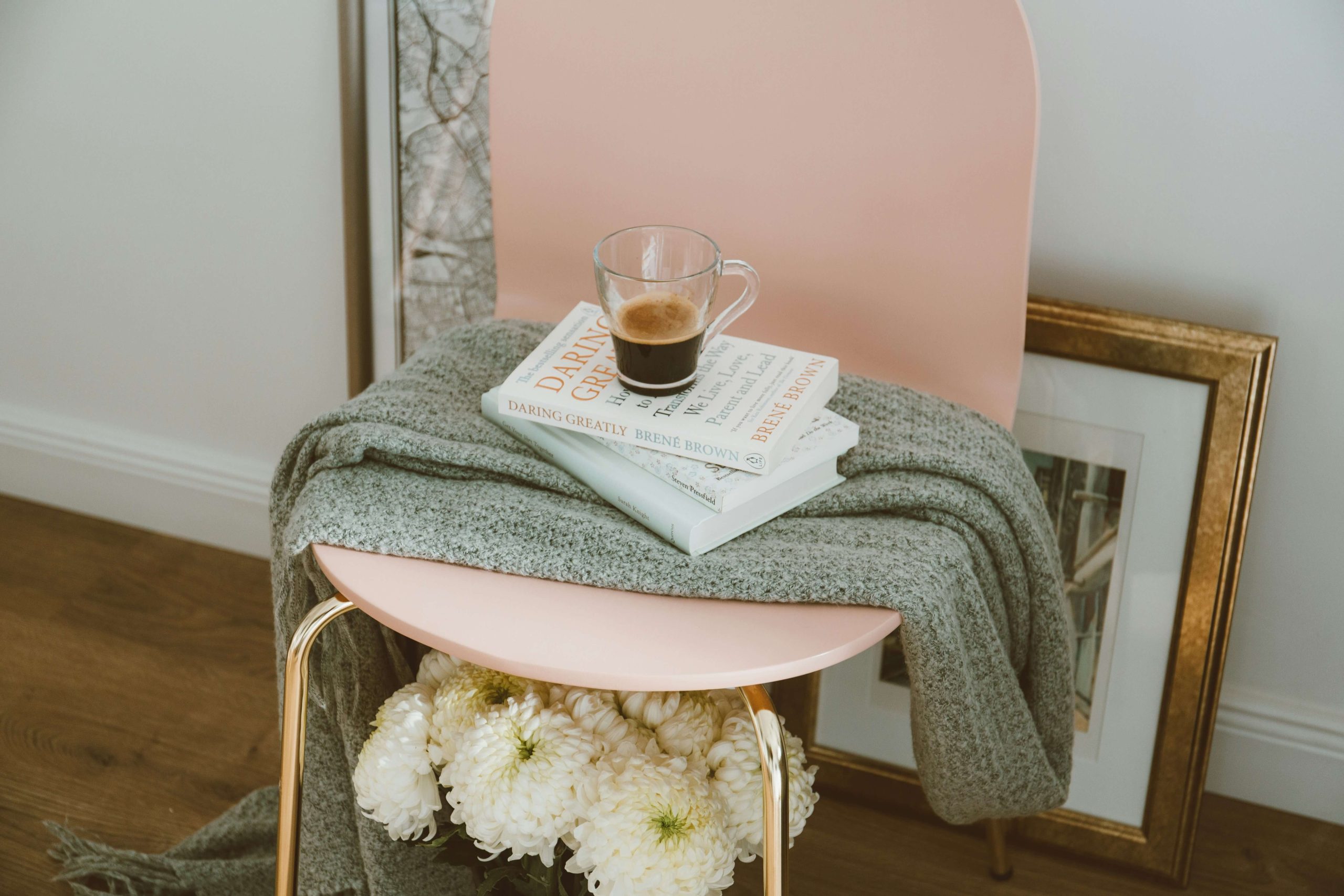 Coffee resting on books